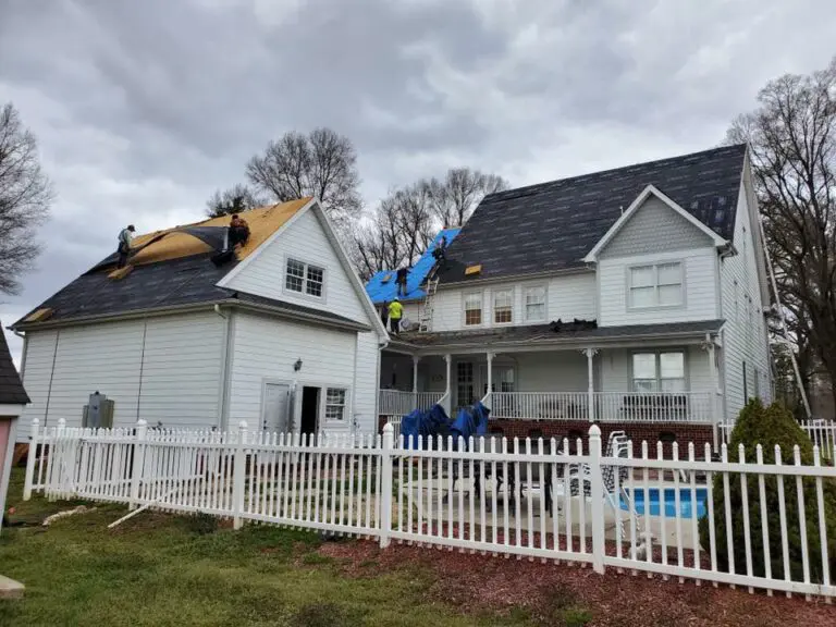 Lanier Rooging team replacing a roof after storm damage