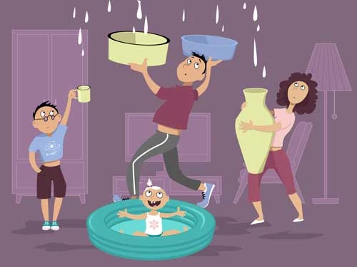 6 of the Most Common Causes of Roof Leaks A family experiencing a roof leak in their house.